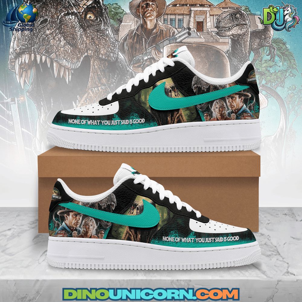 Jurassic World Air Force 1 Sneaker Jurassic World Air Force 1 Sneaker: Custom Jurassic World-themed Nike Air Force 1 sneakers featuring a black and white leather base with vibrant teal swooshes. The side panels display detailed artwork of characters and dinosaurs from the Jurassic World franchise, including a T-Rex and lead characters. The phrase “NONE OF WHAT YOU JUST SAID IS GOOD” is printed along the outer sole area. The tongue and heel area include Jurassic World logos, blending iconic imagery with streetwear style.