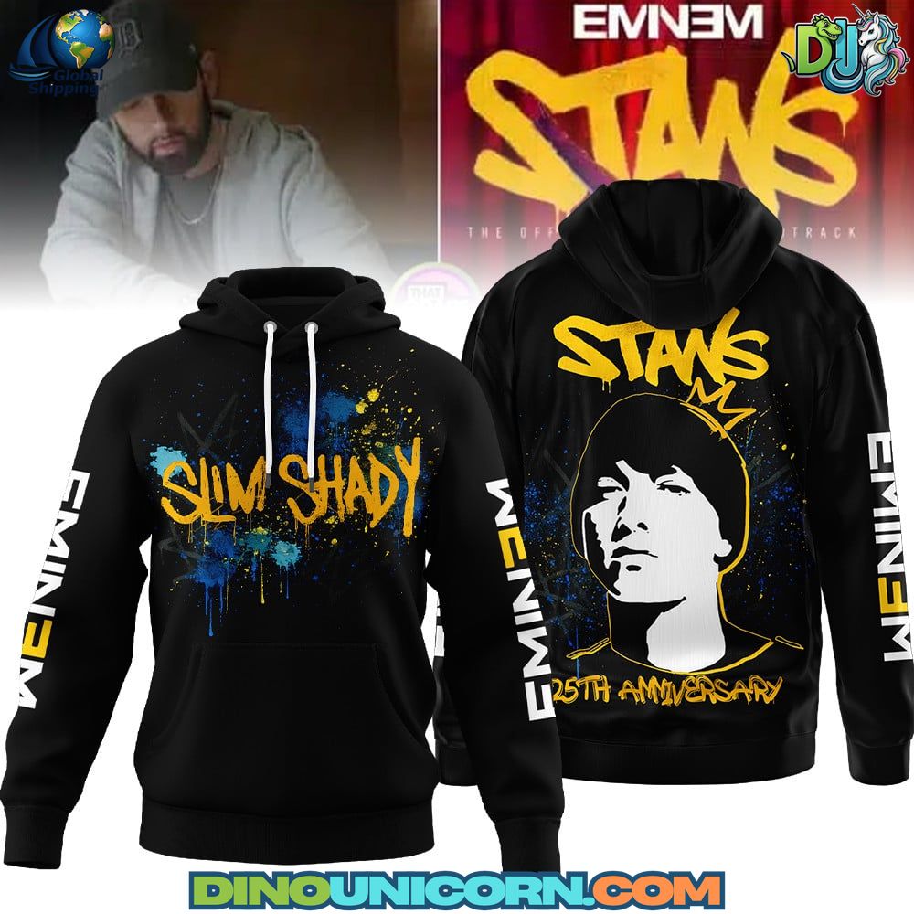 Eminem Stan 25th Anniversary Hoodie Close-up of a black and yellow Eminem Stan 25th anniversary hoodie with blue paint splatter graphic and portrait artwork, styled as an urban street fashion hoodie for rap fans.
